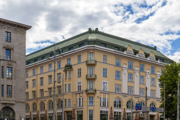 Fototapeta premium Art nouveau corner building with copper roof near Esplanade in Helsinki