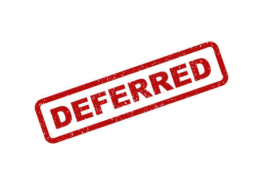 Red deferred rubber stamp impression on a document