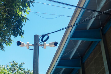 Obraz premium Street View with Utility Pole and Overhead Wires