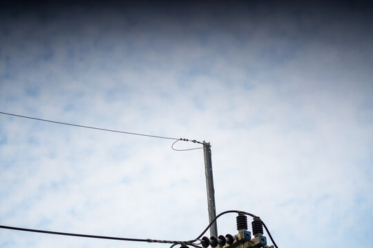 Clear Sky Over Power Line Pole