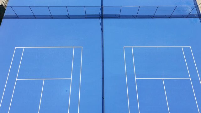 4K top-down aerial view on a tennis court 