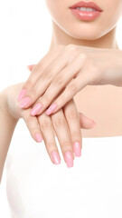 Fototapeta premium The Minimalist Manicure: Serene woman shows clean pink polish manicure on healthy hand nail skin with soft lip details in minimalist white studio portrait