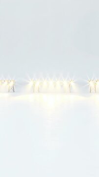 Vertical video: Pulling back camera revealing warm lights on stands in studio, exposing setup