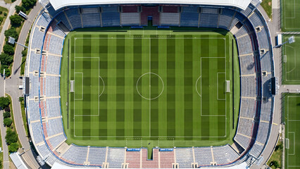 Top down view of stripes pattern on a freshly mown professional soccer pitch © Rifqi