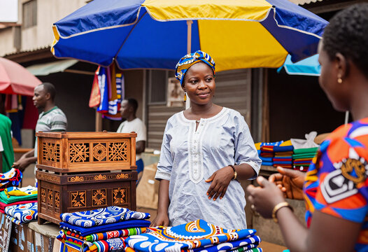 Nigerian Woman Selling Colorful Fabrics at Lagos Craft Market