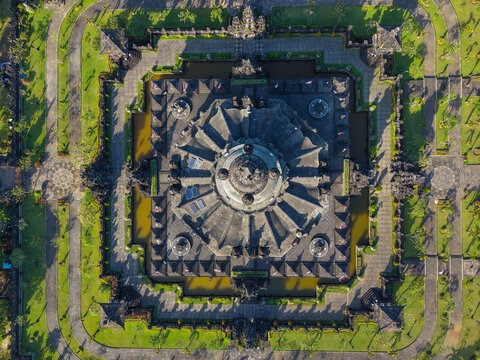 The sacred monument complex of Bajra Sandhi stands in vivid contrast to the dense terracotta-roofed residential districts of Denpasar spreading out to every horizon beyond.