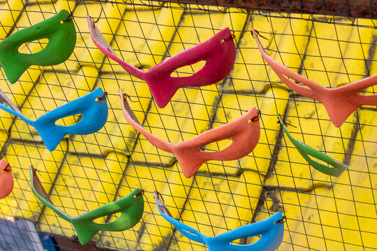 Carnival masks tied to ram wire in Malang's colorful village