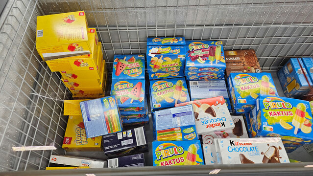 Many frozen desserts ice cream in supermarket freezer
