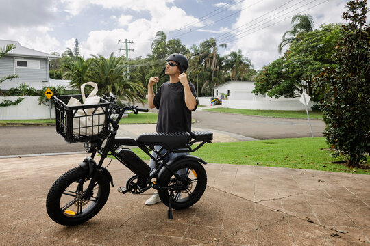 Fastening helmet before riding electric bike