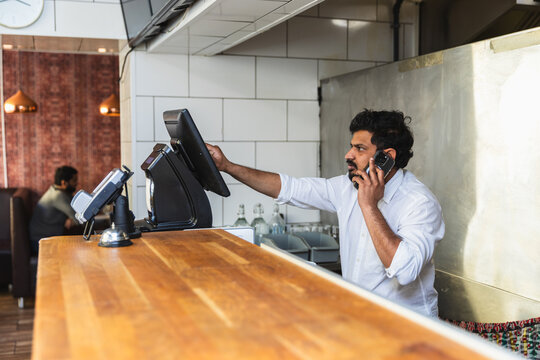 Manager multitasking on phone and POS system