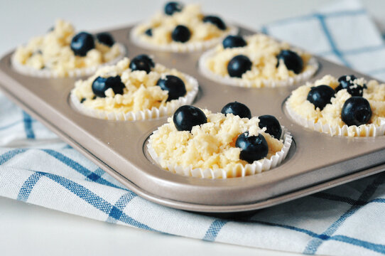Closeup of homemade blueberry muffins on a table at home
