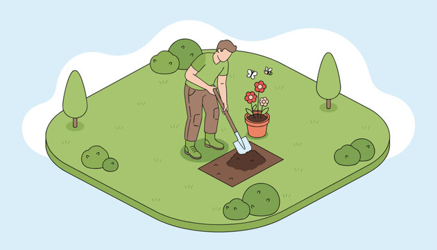 Hardworking man using a shovel to dig a hole for planting flowers in his backyard garden on a beautiful sunny day.