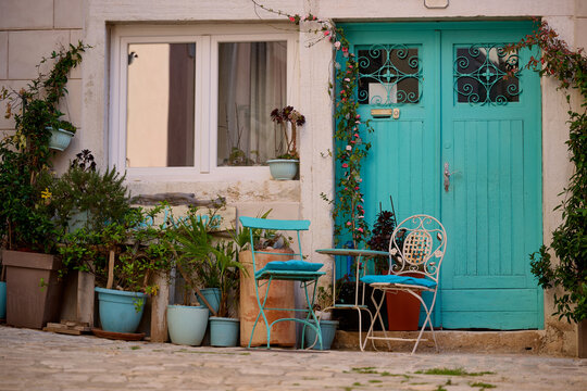 Turquoise doorway with garden patio
