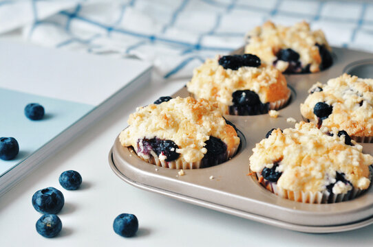 Closeup of homemade blueberry muffins on a table at home