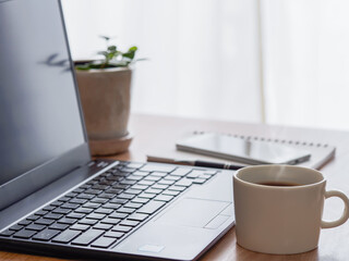 Fototapeta premium Workspace with Coffee and Laptop