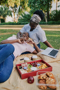 Friends on a picnic outdoors