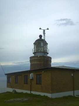 Kullens fyr lighthouse at dusk on Kullaberg headland, Sk&aring;ne