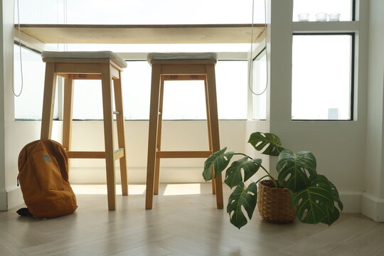Bright cozy breakfast area. Sunny eatery with natural decor