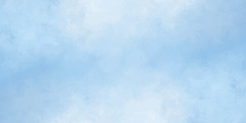 Fototapeta premium Blue watercolor background texture with soft abstract cloudy paint washes for banner designs and creative backdrops. Soft light blue watercolor washes and subtle gradients.