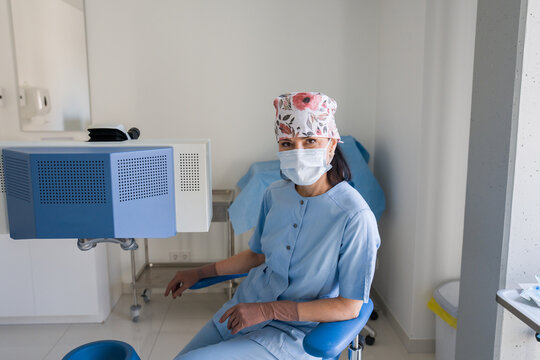 Ophthalmologist Portrait Next To Laser Correction Equipment 