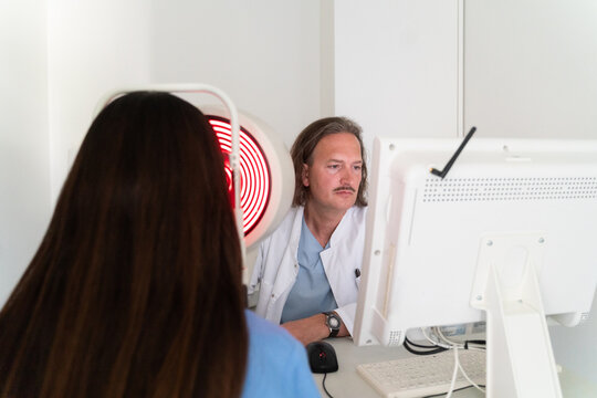 Ophthalmologist Examining Patients Eyes