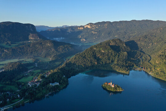 Aerial view of Slovenia's Lake Bled at sunrise. 