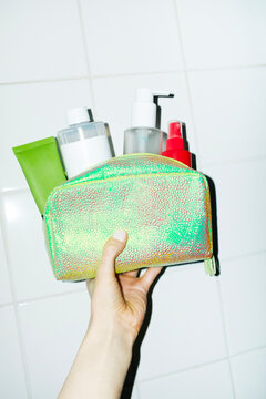 Shiny makeup bag full of cosmetic  beauty makeup projects with flash