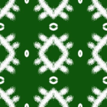 Seamless Ethnic Ikkat Pattern with White Tribal Motifs on Dark Green Background