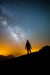 Fototapeta premium Woman silhouette observing Milky Way on Roque de los Muchachos