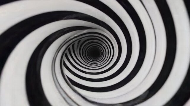 A black and white spiral design rotating inward as an abstract monochrome looping background