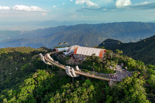 Stunning ba na hills in Da nang Vietnam at sunset with golden bridge.