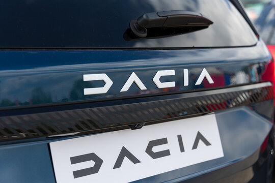 Koprivnice, Czech Republic, Czechia - 31 May, 2026: Dacia - logo and brand of car and auto manufacturer. Detail of vehicle. Very shallow focus.