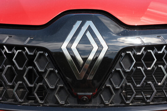 Koprivnice, Czech Republic, Czechia - 31 May, 2026: Renault - logo and brand of car and auto manufacturer. Detail of red vehicle.