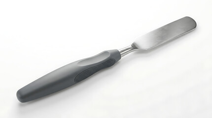 Fototapeta premium Ergonomic professional dental mixing spatula with gray handle and stainless steel blade for preparing dental materials and impressions in laboratory or clinic setting on clean white background.