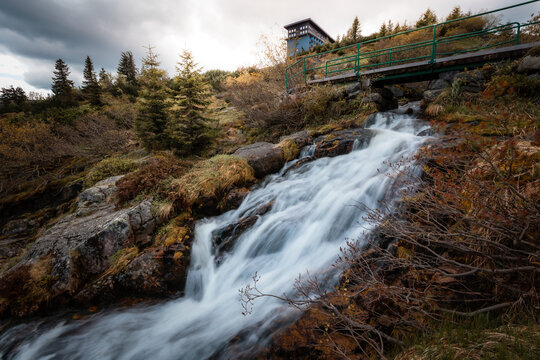 Beautiful Labsky waterfall cascades rushing through mountain forest near Labska bouda