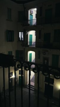 Milanese Apartment Building Courtyard Establishing Shot at Night