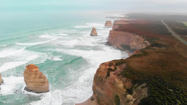 Aerial view of Twelve Apostles from drone, Australia. Collection of limestone stacks. Slow motion