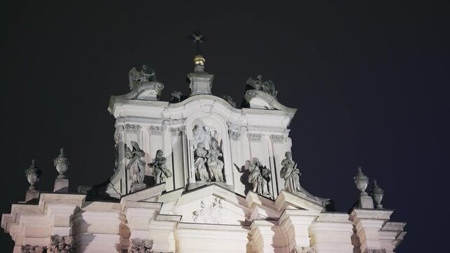 Ornate Facade of Warsaw's Visitationist Church Illuminated at Night