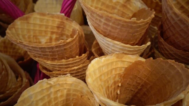 Karlskrona, Sweden A stack of freshly made ice cream waffle cones in an ice cream shop.