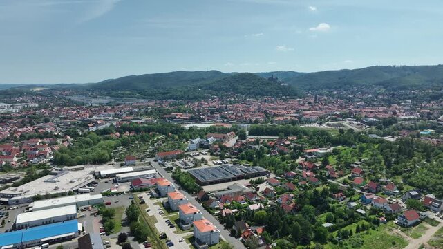 Drone footage of Galgenberg and Zaunwiese with Wernigerode Old Town and Wernigerode Castle in the background, Harz Region, Saxony Anhalt, Germany