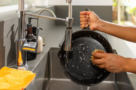 Eco friendly kitchen cleaning with cast iron skillet and natural dish soap