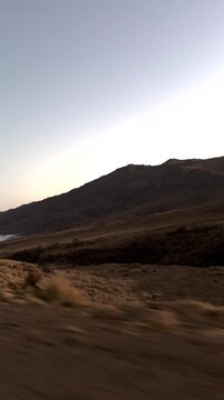 Sunset in the Calchaquies Valleys driving close to the clouds.Travelling trough Argentina. Adventure tourism. Ideal for tourism promotions.Winter Landscape of Tucuman, in Calchaqui Valley, Argentina. 