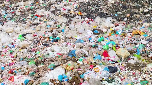 Plastic waste pollution dumping site environmental disaster video motion clip