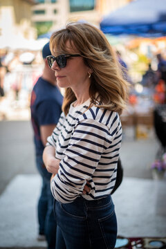 Portrait of stylish mature woman at outdoor market