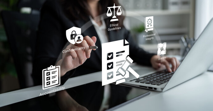 A professional woman engages in a discussion about ethics and accountability while using her laptop in a modern office setting, highlighting essential workplace values. Ledger