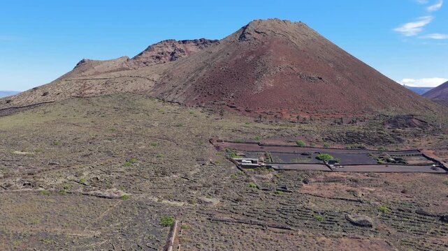 Aerial flyover above Volcan Corona Crater in Lanzarote - Volcanic Activity and Eruptions in the Canary Islands