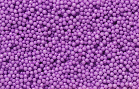 Pink circle styrofoam ball background and texture, foam pattern, concept of microplastics and pollution