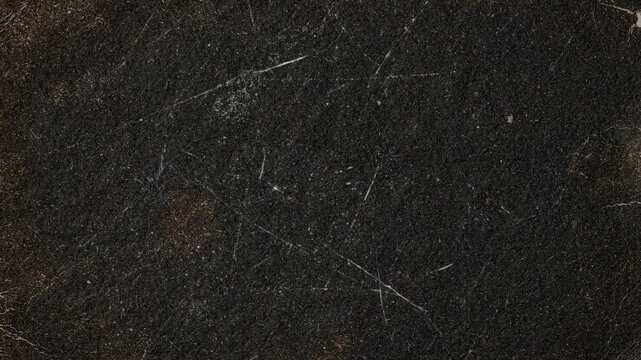 Abstract dark black textured surface with subtle distressed details and organic patterns.