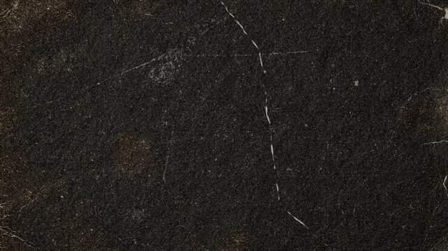 Abstract dark black stone texture with white cracked lines overlay.