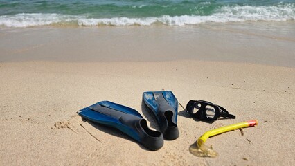 Snorkeling gear, blue flippers and diving mask on a sandy beach in Portugal. Summer vacation © LadyLensArt 